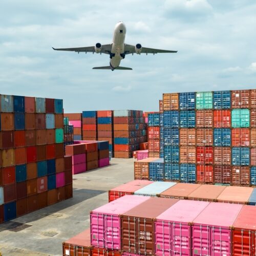 Airplane,Flying,Above,Container,Logistic.,Container,Crisis.,Freight,Transportation.,Logistic